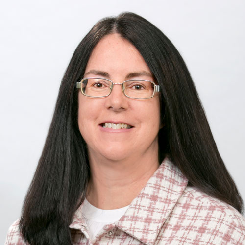 Photo portrait of Judi McDermott, Manager