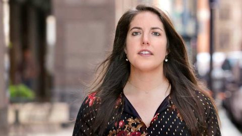 Elena Sundin wearing a floral and polka dot shirt.